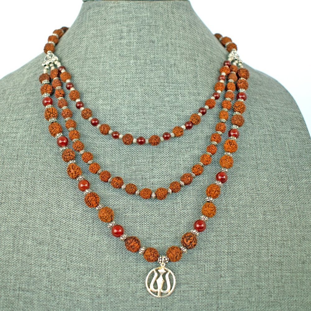 Rudraksha Beads with sterling silver trident and carnelian beads  100.00